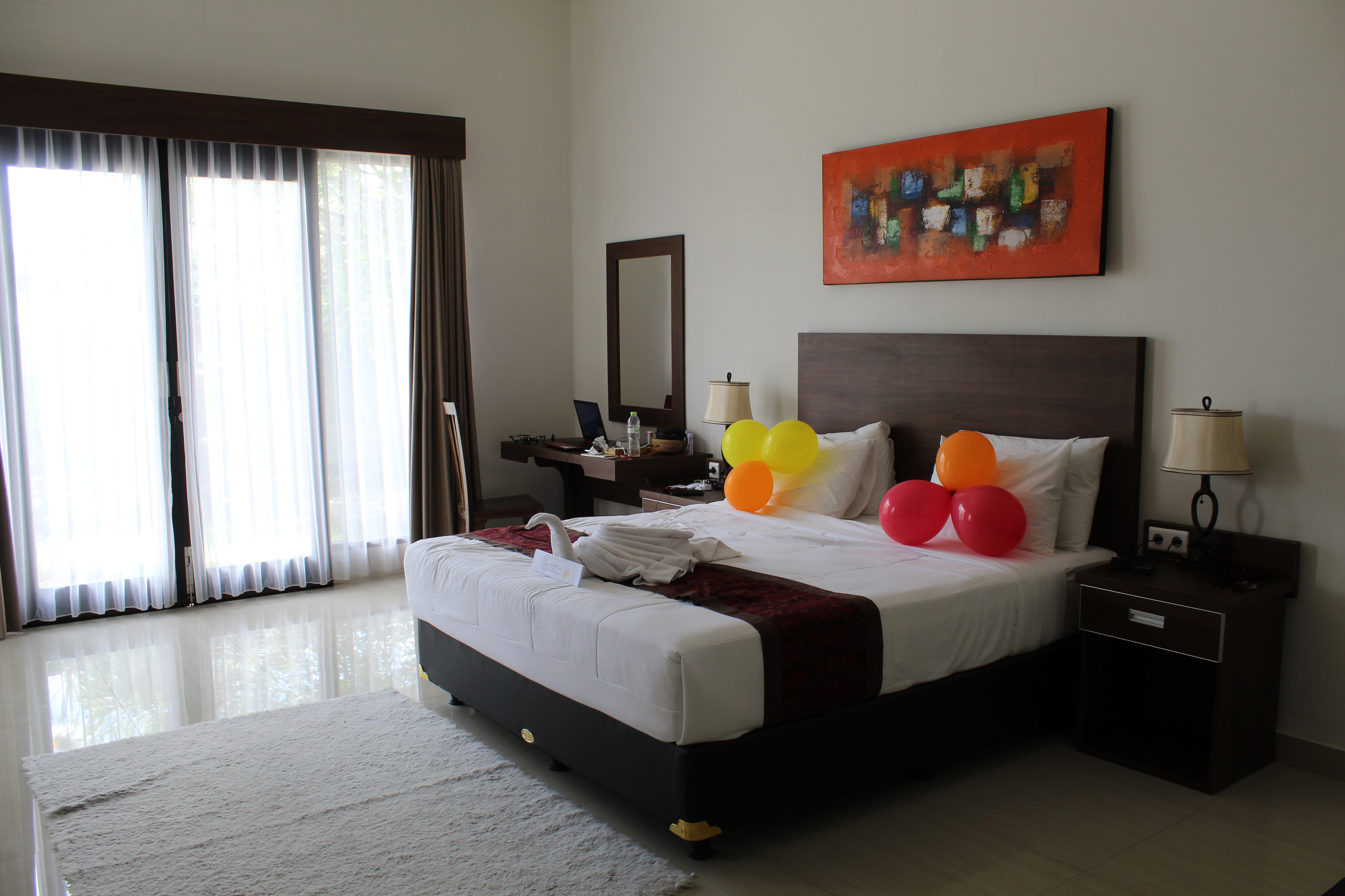 bedroom with balloons at adil villa and resort in bali